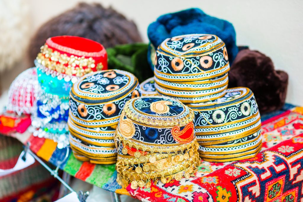 Azerbaijan old style hats on a local market. Oriental headdress on Festive fair on Novruz holiday